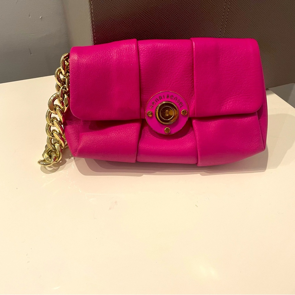Clutch. Pink. Gold hardware.